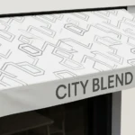 Example of shop awning sign printing by Dot2Dot Printing, Marrickville, Sydney